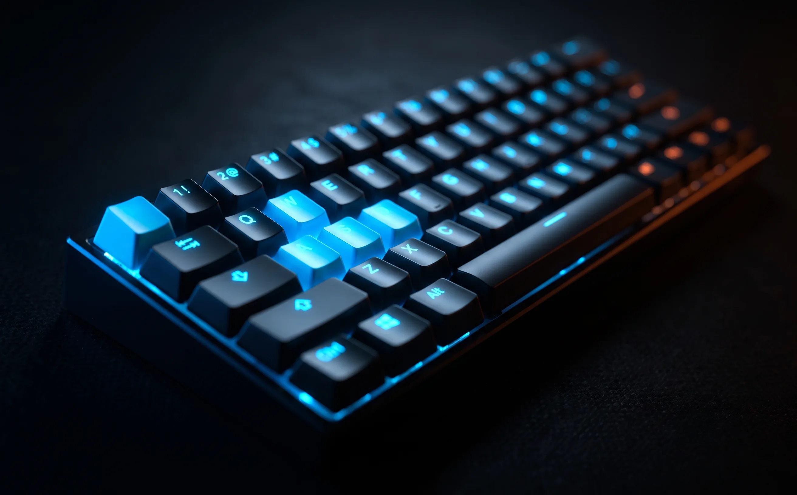 SteelSeries Apex Pro Mini 60% keyboard with glowing RGB backlight, close-up angle with blue accent lighting